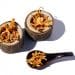 Cordyceps candida health benefits, in a spoon on a table